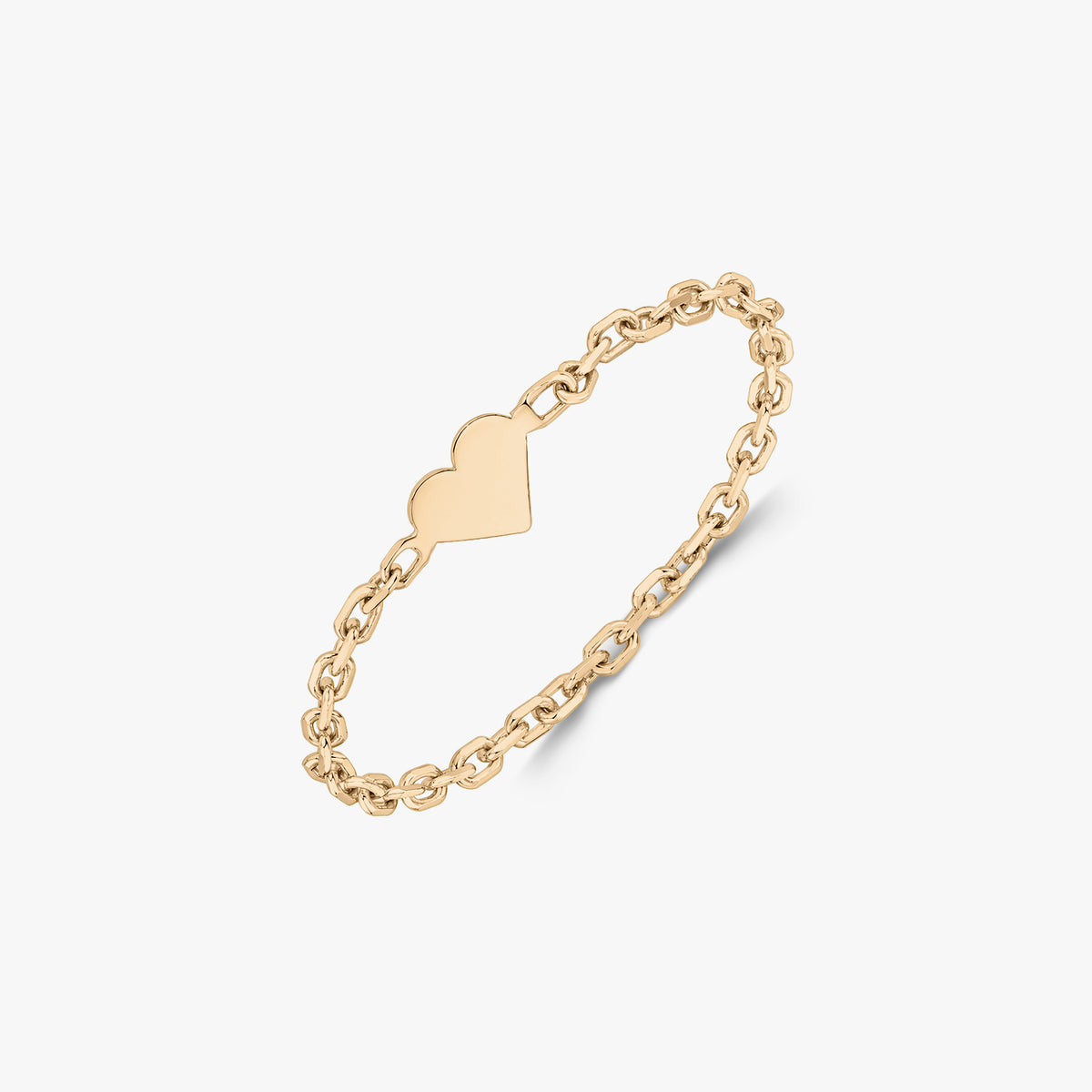 14K yellow gold chain ring with a small flat heart plaque, photographed on a white background.