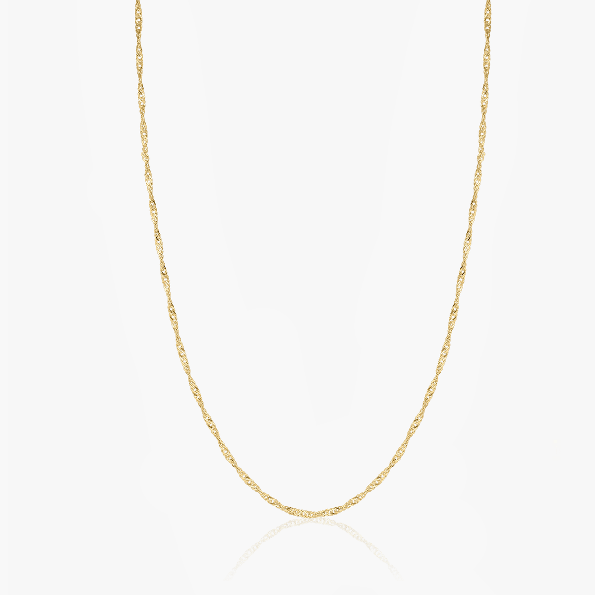 Gold-plated Singapore silver chain on a white background