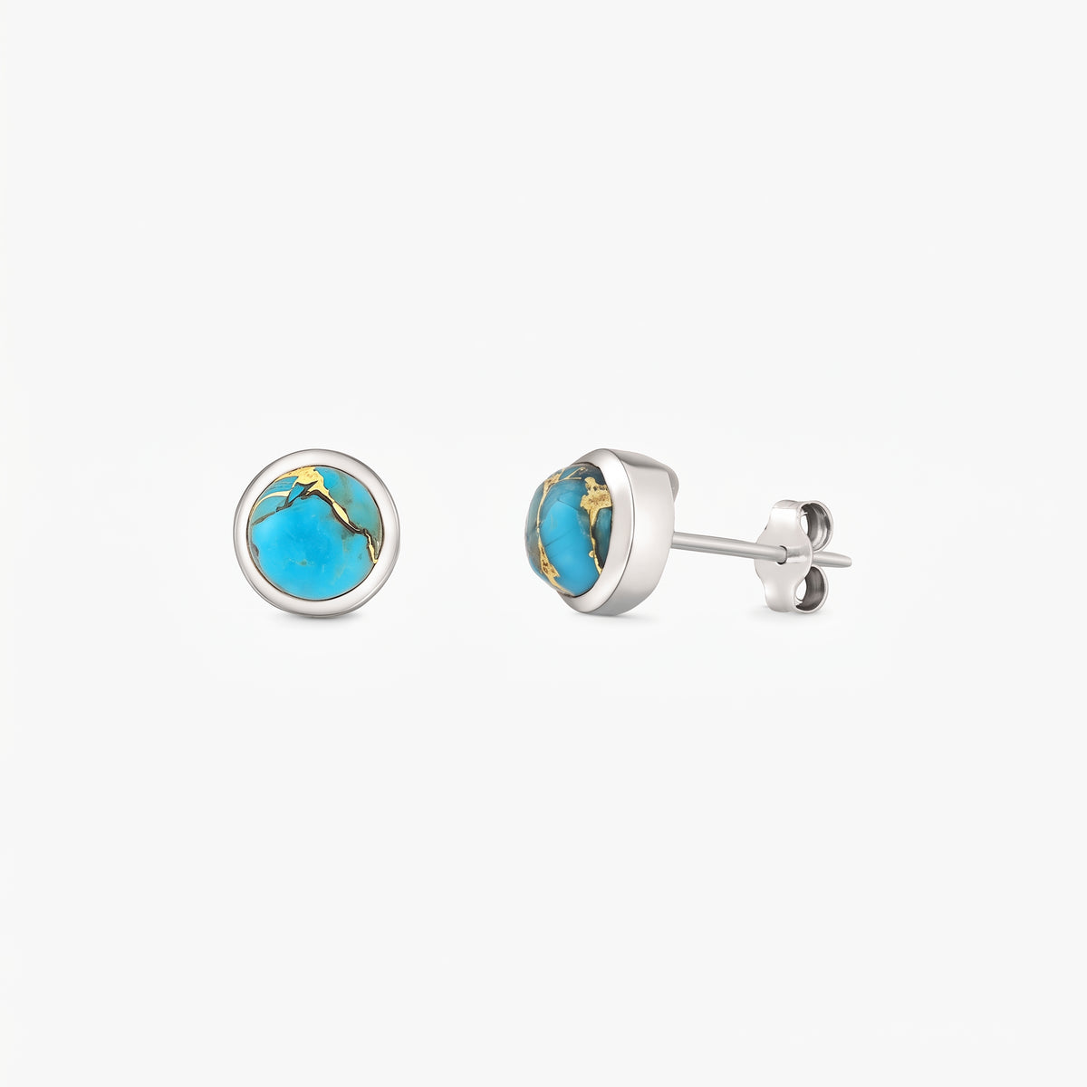 Pair of sterling silver stud earrings featuring round blue copper turquoise cabochons in bezel settings on a white background.