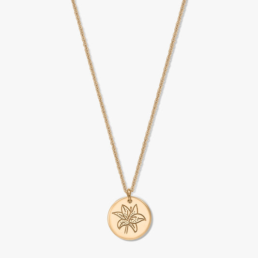 Gold‑tone 925 silver necklace with a round disc pendant engraved with a lily flower, shown centered on a white background.