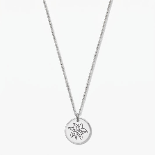 Sterling silver birthflower necklace with a round disc pendant engraved with a lily (May), shown on a white background.