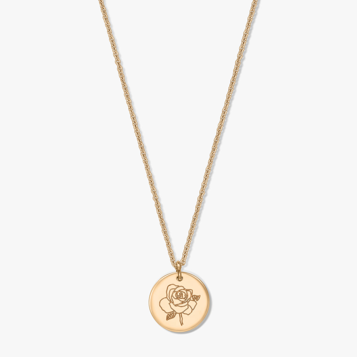 Gold‑plated silver necklace with a round medallion engraved with a rose, photographed centered on a white background.