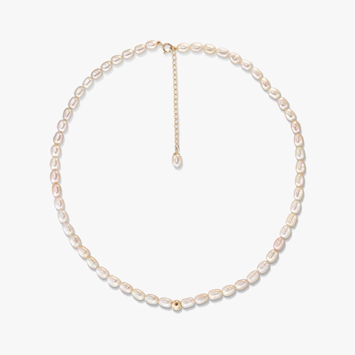 Blair gold necklace with natural oval pearls arranged in a circle on a white background, featuring a 14K gold clasp, extender chain, and a small gold accent bead.