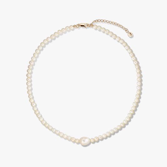 Golden Chanti silver necklace with white cultured pearls and an adjustable extender chain on a white background.