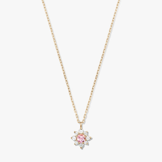 14K yellow gold necklace with a delicate chain and a floral pendant featuring a pink morganite center surrounded by white sapphires on a white background.