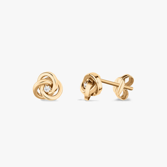 Pair of Eternal Knot gold earrings with zirconia stones on a white background.