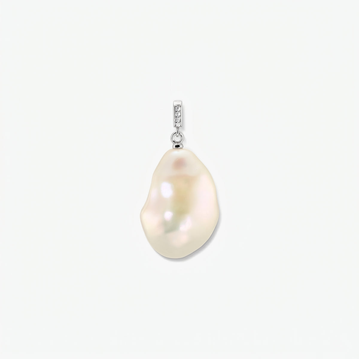 Rhodium-plated baroque pearl pendant with a zirconia-accented bail on a clean white background, centered.