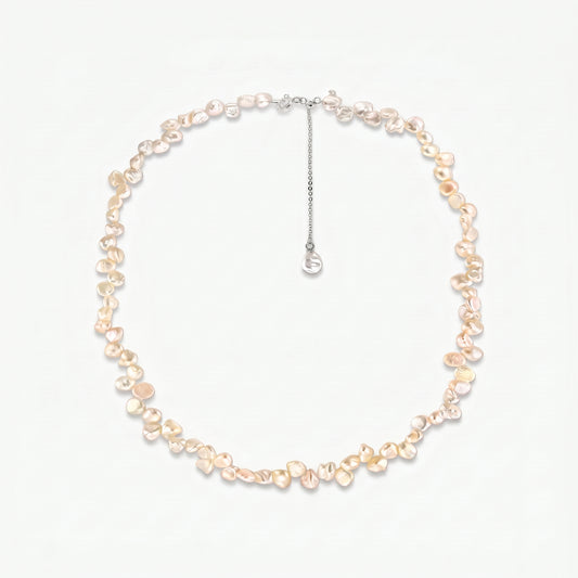 Brielle sterling silver necklace with pink keshi freshwater pearls and an adjustable extender chain on a white background.