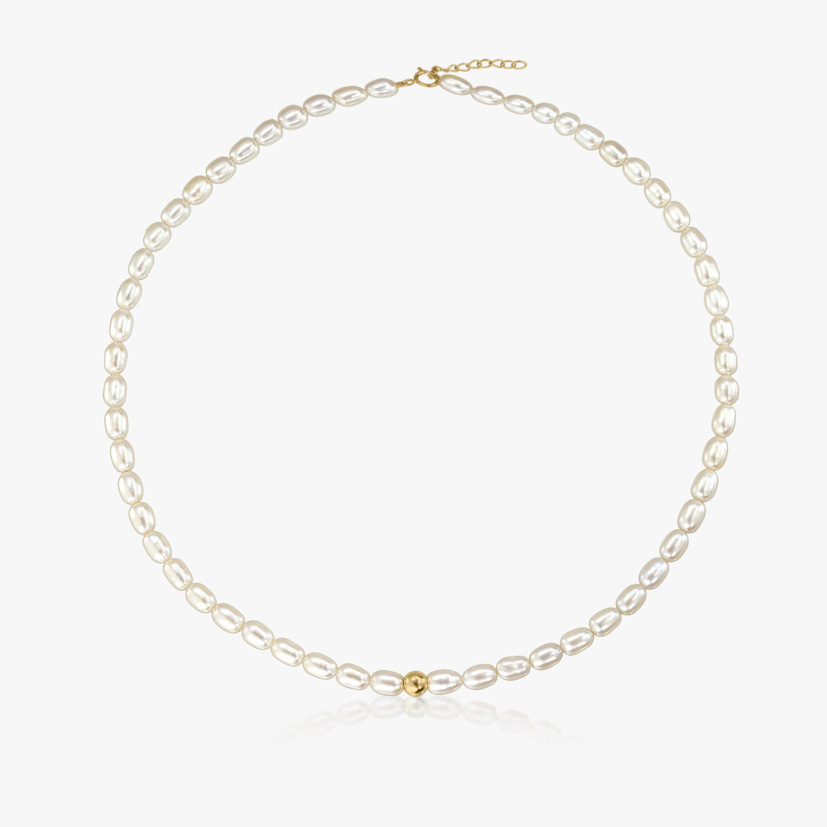 A pearl necklace with a gold clasp on a white background
