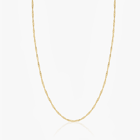 Gold-plated Singapore silver chain on a white background