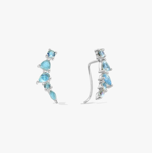 Pair of sterling silver ear climber earrings with graduated blue labradorite stones on a white background, shown in front and side views.