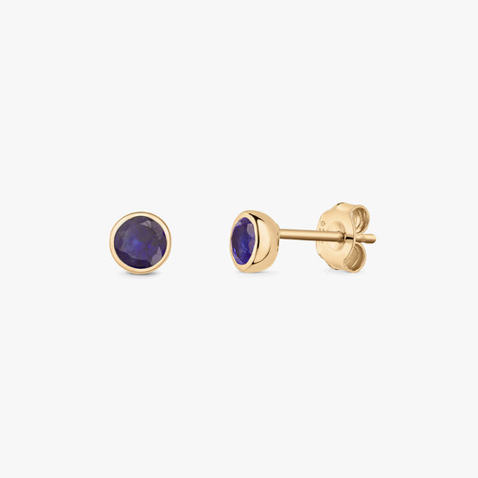 Pair of September birthstone sapphire stud earrings in silver with a golden bezel setting, shown on a white background.