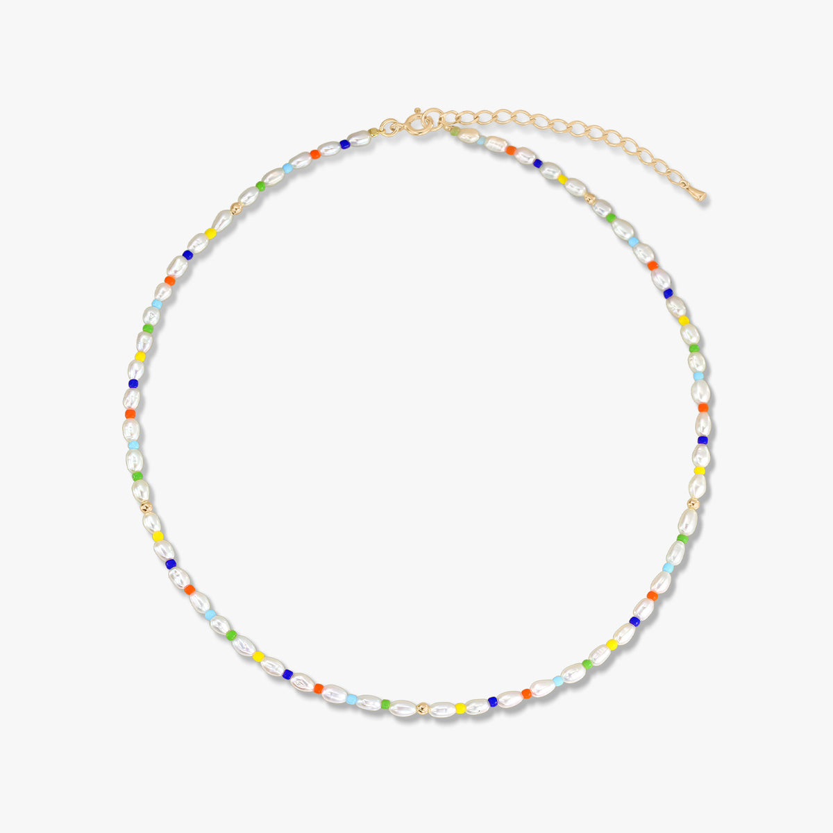 Delicate gold-plated sterling silver necklace with small cultured pearls and multicolored beads, finished with an adjustable extender chain, photographed on a white background.