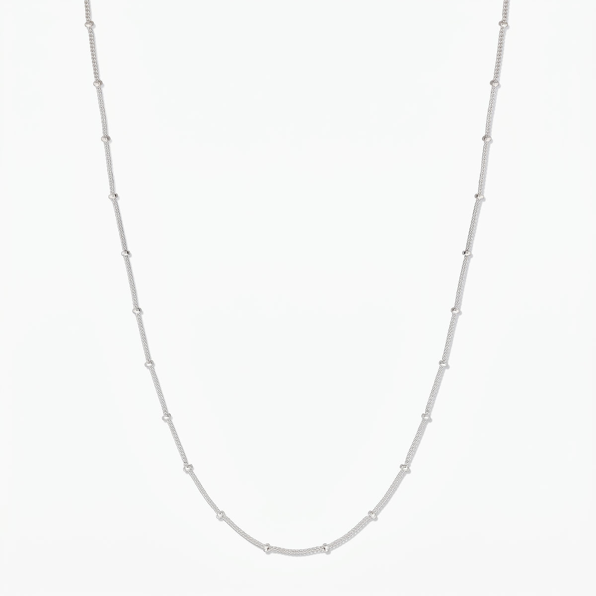 Sterling silver beaded chain necklace on a white background, full-length product image.