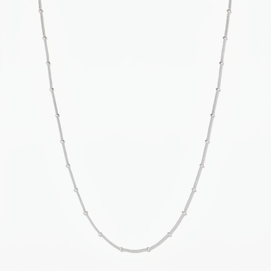 Sterling silver beaded chain necklace on a white background, full-length product image.