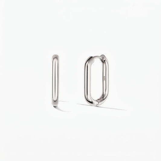 Pair of silver square hoop earrings on a white background, one shown from the side and one slightly open to reveal the hinged clasp.