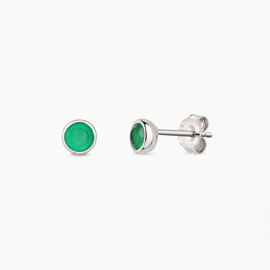 Pair of silver stud earrings with bezel‑set green onyx stones on a white background, shown front and side with butterfly backs.