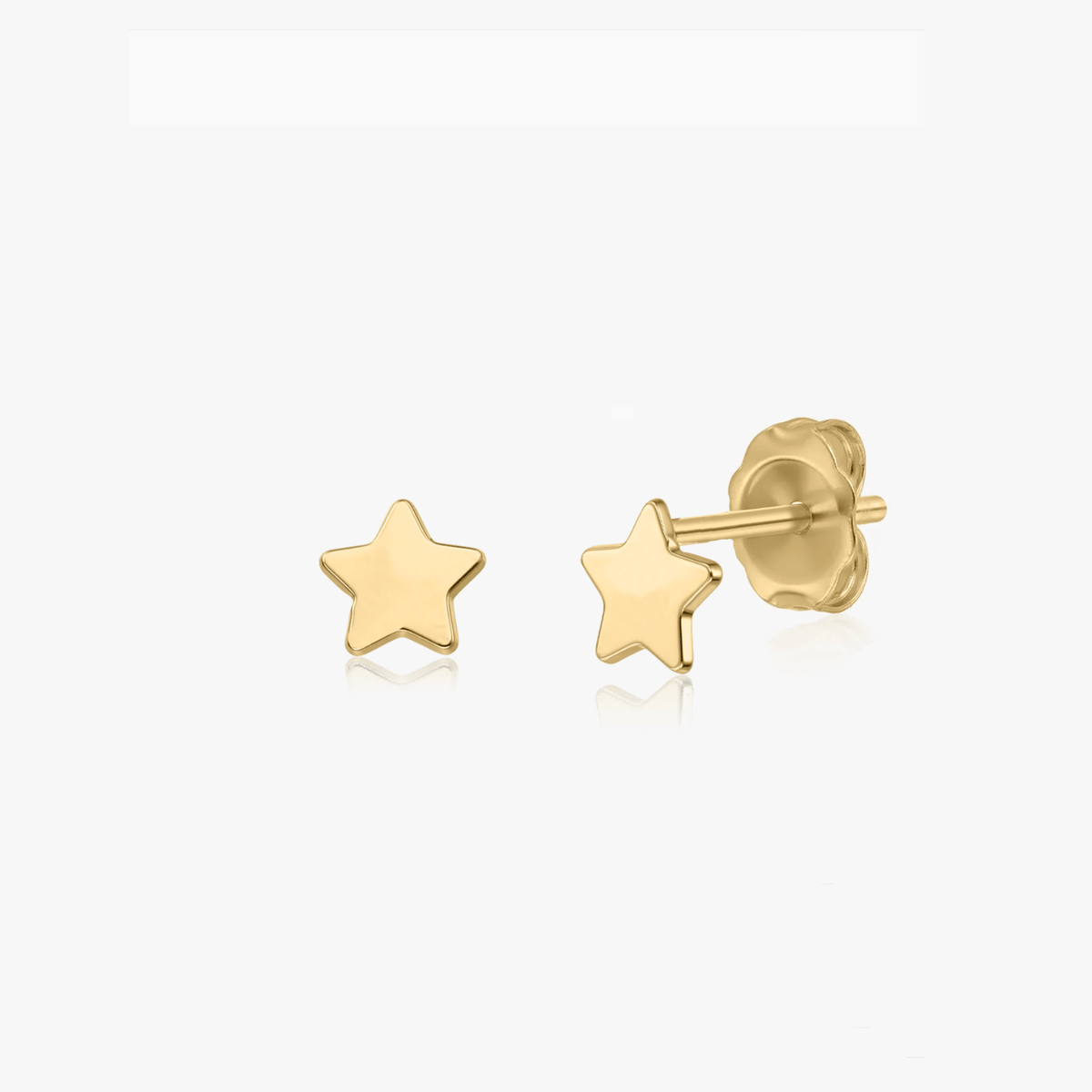 Pair of 14K gold star-shaped earrings on a white background