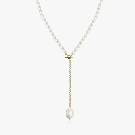 Silver Necklace with Golden Accent and Natural Pearl on a white background